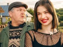 головна
